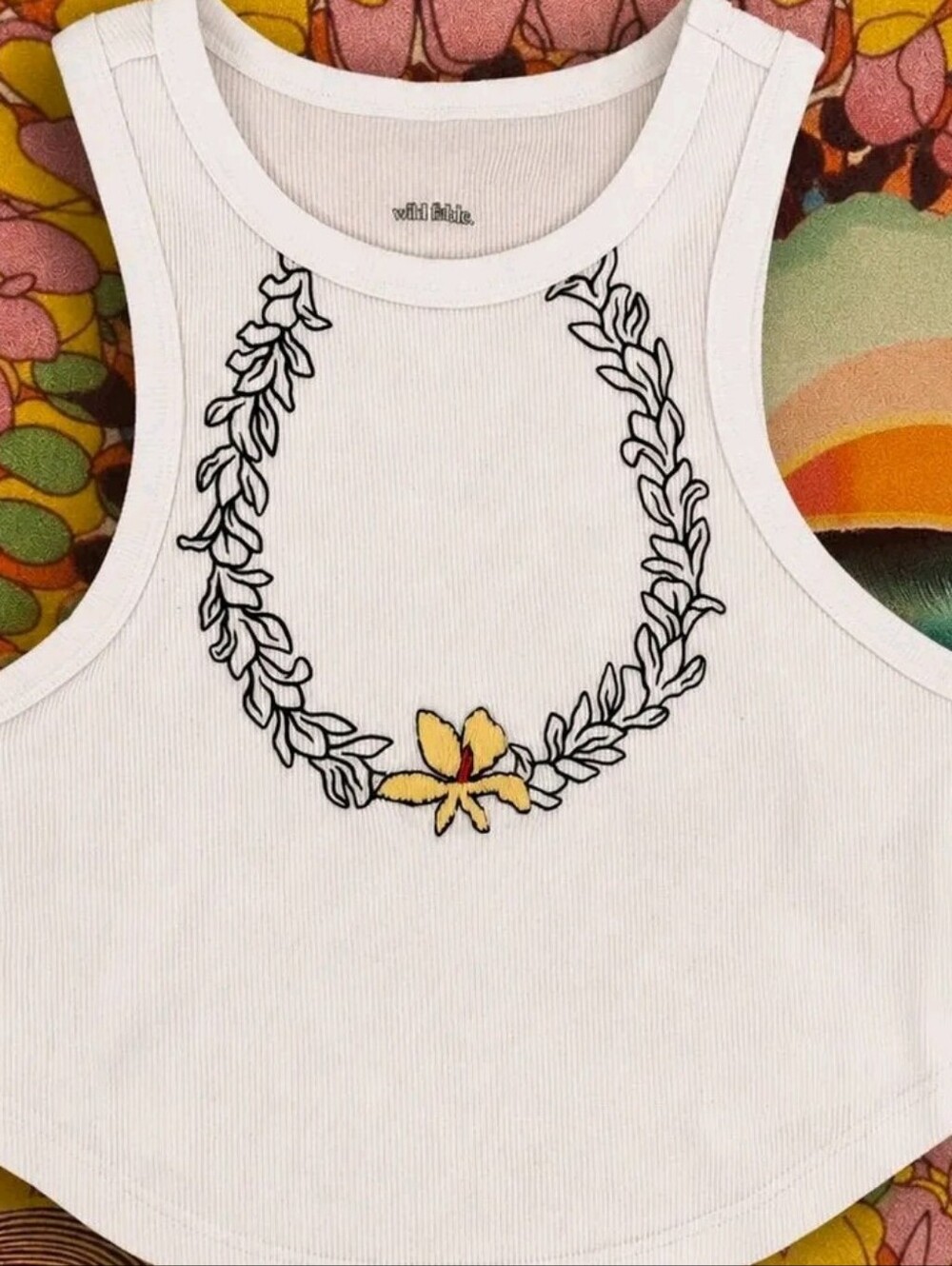 White Ribbed Crop Tank with Black Leaf Wreath an Embroidered Yellow Flower